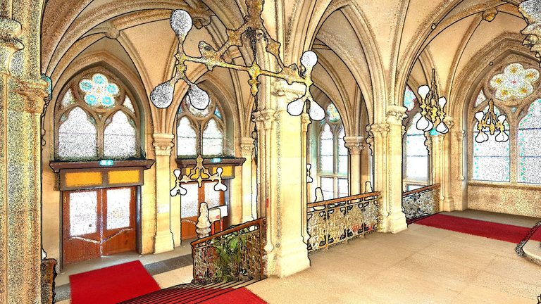 Colorized SLAM point cloud of a historic town hall interior with vaulted arches, captured with a Lidaretto scanner
